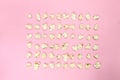 Pop corn symmetric on pink paper