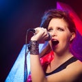 Pop star singing on stage Royalty Free Stock Photo