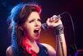 Pop star singing on stage Royalty Free Stock Photo