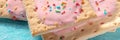 Pop tart close-up panoramic banner on blue Royalty Free Stock Photo