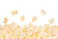 Popcorn as decorative frame with flying corn, isolated, with copy space.