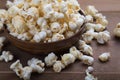 Popcorn bowl on wooden Royalty Free Stock Photo