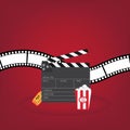 Popcorn box film strip, clapper board and ticket Royalty Free Stock Photo