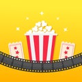 Popcorn box. Film strip rounded. Two tickets admit one. Cinema icon set in flat design style. Pop corn icon. Yellow gradient backg Royalty Free Stock Photo