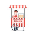 Popcorn cart with seller Royalty Free Stock Photo