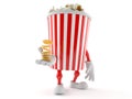 Popcorn character with coins Royalty Free Stock Photo