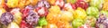 Popcorn in colored caramel glaze, close-up background, long photo