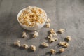 Popcorn on a concrete gray background Royalty Free Stock Photo