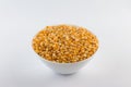 Popcorn corn. Raw grain in a bowl Royalty Free Stock Photo