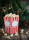 Popcorn in the cup on background of Christmas