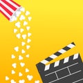 Popcorn falling from round box. Open clapper board. Movie Cinema icon Flat design style. Pop corn raining down in the air. Yellow