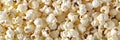 Popcorn filled background a texture of popped corn kernels creating a unique backdrop