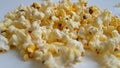 Popcorn flies on a white background slow motion