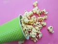 Popcorn glass colored background treat cooked