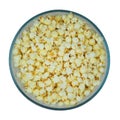 Popcorn large bowl on a isolated on white background. Fast food for cinema. Top view. Royalty Free Stock Photo