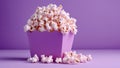 Popcorn for movie, cinema. Popcorn in violet bucket isolated on purple background. Banner pop corn salty cheese fast food snack Royalty Free Stock Photo