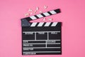 Popcorn, movie clip on pink background top view, copy space Royalty Free Stock Photo