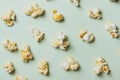 The popcorn in paper cup on green background. Royalty Free Stock Photo