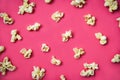 Popcorn pattern on red background on top view Sweet butter popcorn Royalty Free Stock Photo