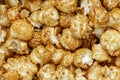 Popcorn Pattern. Sweets. Caramel popcorn textured background. Food, cinema, movie. Top view Royalty Free Stock Photo