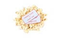 Popcorn pile with tickets isolated on white background Royalty Free Stock Photo