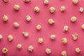 Popcorn on a pink background Royalty Free Stock Photo