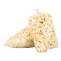 Popcorn in a Plastic Bag Tied with a Rubber Band on White Background Royalty Free Stock Photo