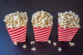 Popcorn in red and white container on a dark background Royalty Free Stock Photo