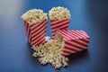 Popcorn in red and white container on a dark background Royalty Free Stock Photo