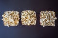 Popcorn in red and white container on a dark background Royalty Free Stock Photo