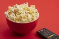Popcorn with Remote Control Royalty Free Stock Photo