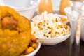 Popcorn served on a white dish, typical side dish of ceviche