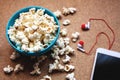Popcorn with a smartphone Royalty Free Stock Photo