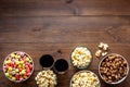 Popcorn and soda - cinema snacks - on wooden table from above space for text Royalty Free Stock Photo