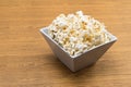 Popcorn in a square shape bowl