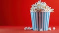 The Popcorn in Striped Container.AI generated image Royalty Free Stock Photo