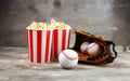 Popcorn on the table with draft beer. Baseball party food with balls for the playoffs