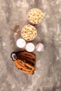 Popcorn on the table with draft beer. Baseball party food with balls for the playoffs