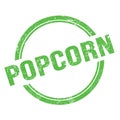 POPCORN text written on green grungy round stamp