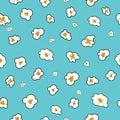 Popcorn vector seamless pattern on blue background. Popcorn is a delicious snack that you enjoy while watching movies