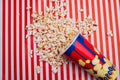 Popcorn was scattered from bucket. Royalty Free Stock Photo