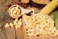 Popcorn and yellow dry corn grain with fresh corn. Royalty Free Stock Photo