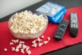 Popcorns in a bowl on a table Royalty Free Stock Photo