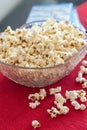 Popcorns in a bowl on a table Royalty Free Stock Photo