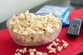 Popcorns in a bowl on a table Royalty Free Stock Photo