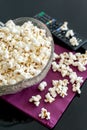 Popcorns in a bowl on a table Royalty Free Stock Photo