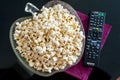 Popcorns in a bowl on a table Royalty Free Stock Photo