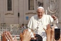 Pope Francis greets the faithful