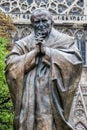 Pope John Paul II statue next to Notre Dame Cathedral in Paris, France. Royalty Free Stock Photo