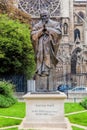 Pope John Paul II statue next to Notre Dame Cathedral in Paris, France. Royalty Free Stock Photo